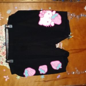 Hello kitty biker shorts with hk face and strawberries size 4